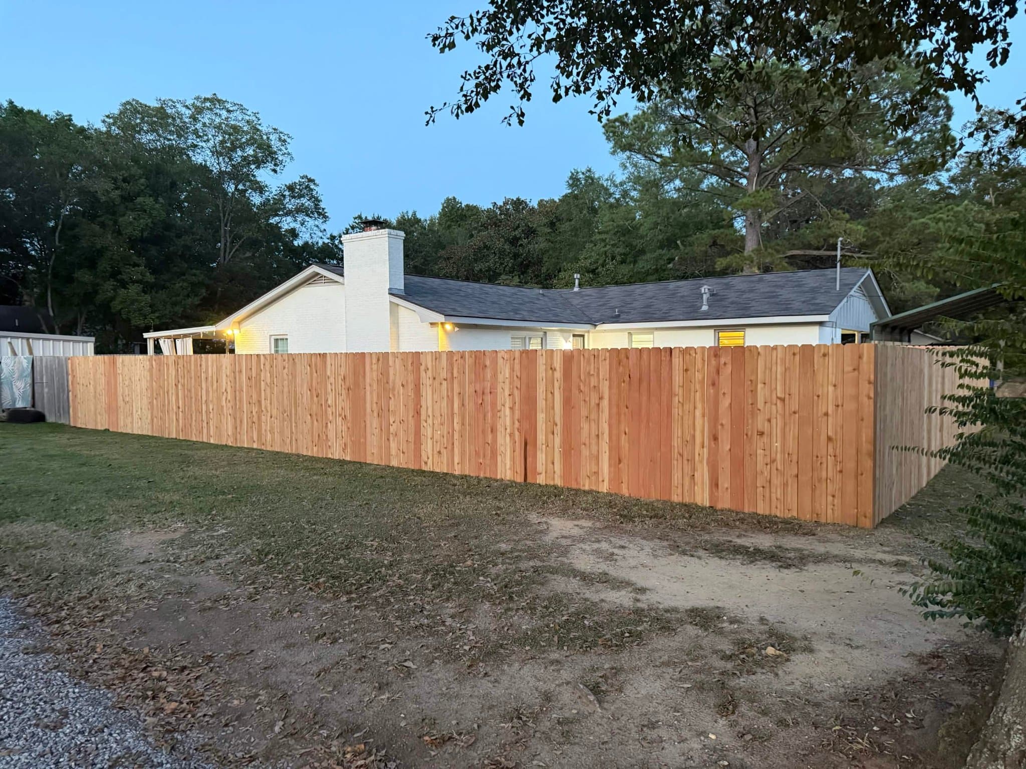 Completed fence installation for a residential property